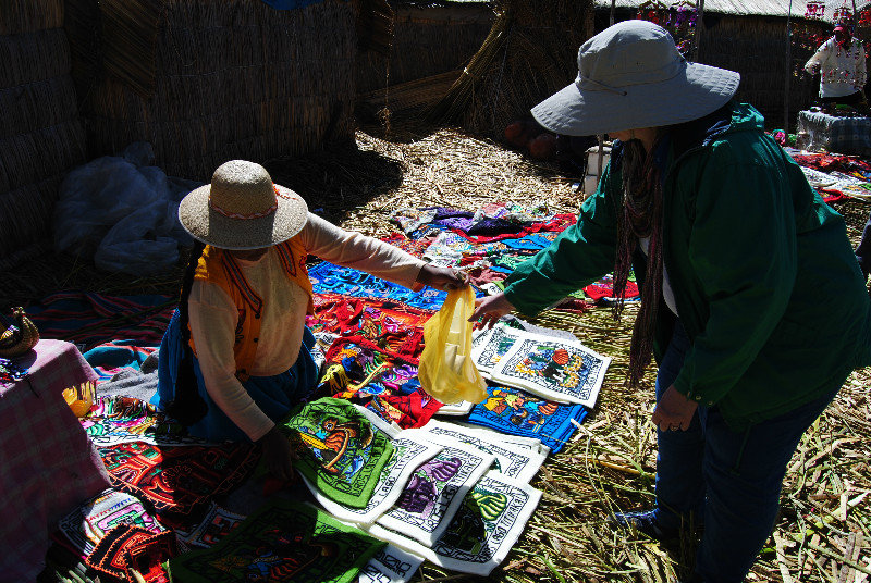 Linda purchasing souvenirs on the Uros Islands