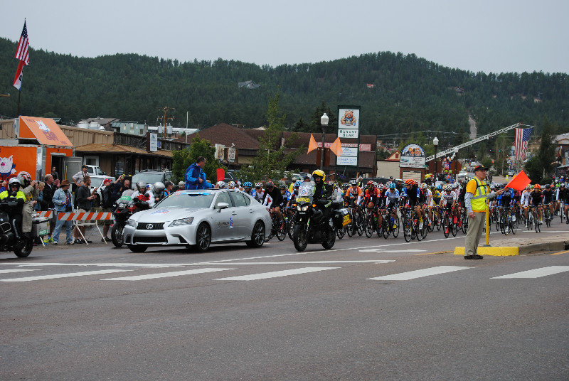 USA Pro Challenge - Pace car closely follower by the bike racers 
