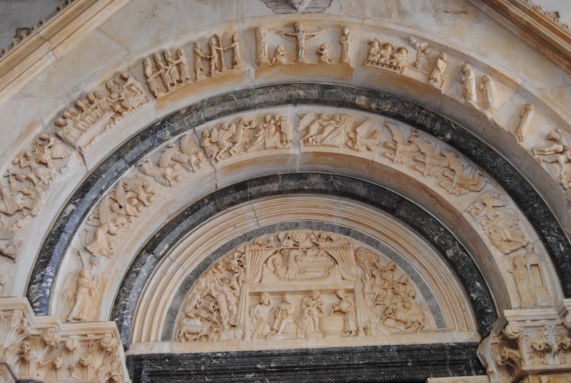 Intricate stone carving over the entrance to the cathedral