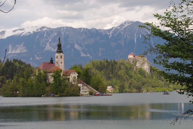Lake Bled with the Church of the Assumption on Bled Island and Bled Castle on a hill