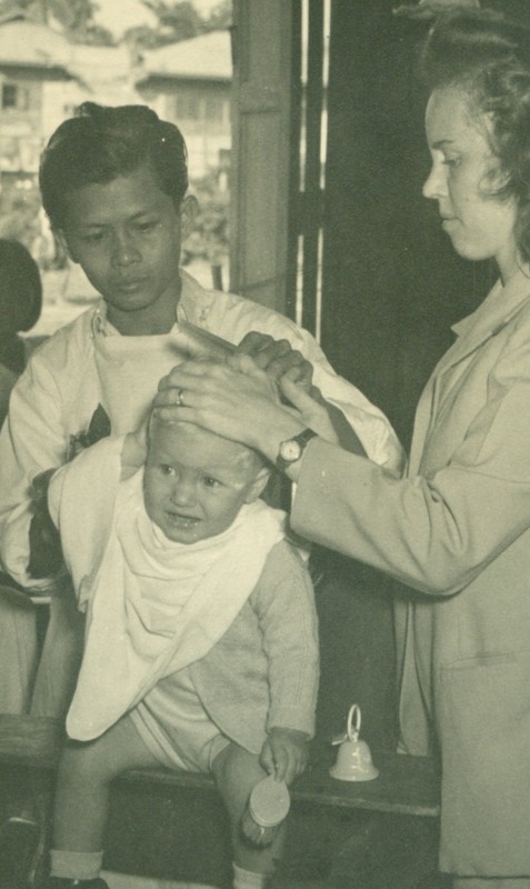 Mom supervising Bob's first haircut