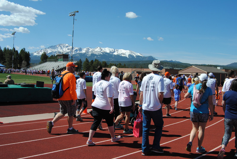 Walkers with Pikes Peak in the background