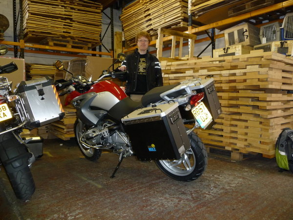 Me and the bike in a shed with some crates