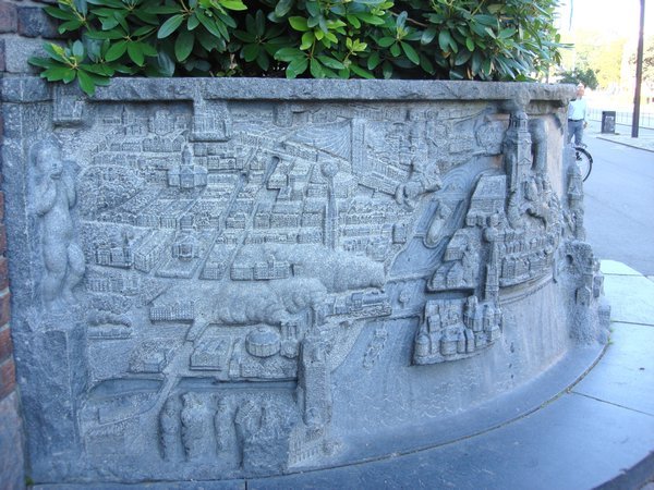 CITY SCAPE CARVED ON CITY HALL WALLS