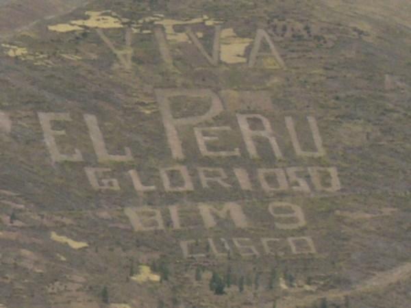 Peruvians love to write stuff on hillsides