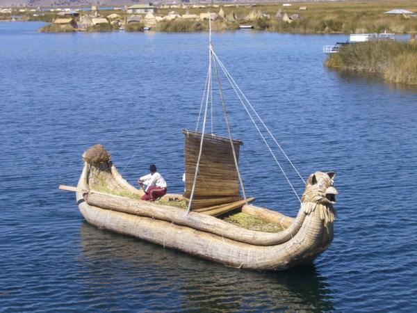 A boat completely made out of reed.