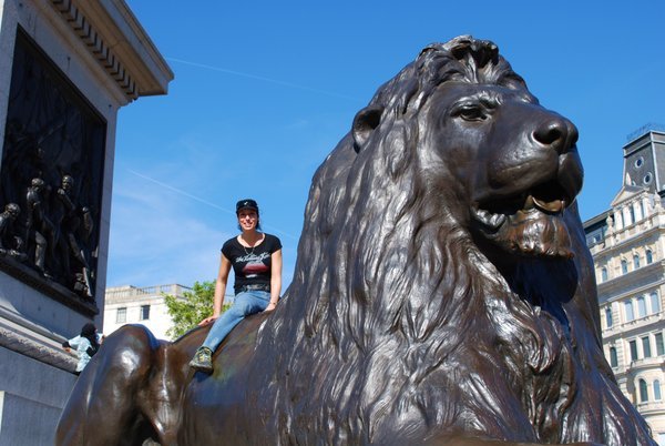 Andrea riding the lions in Trafalgar Square