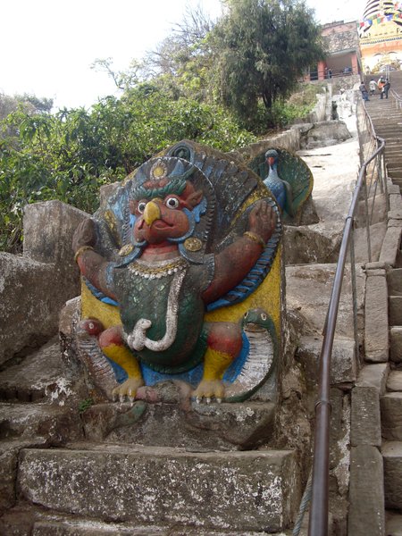 Painted Stone Carvings Along Stairs
