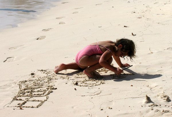 Writing love letters in the sand