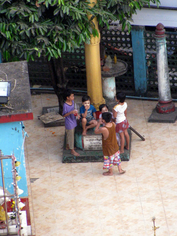 kids playing at neighborhood temple