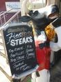 Cow selling steak