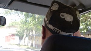 Drive back to Samarkand. Typical hat for men.