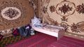 A real bed in a homestay,  weird