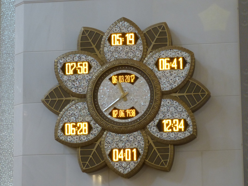 Grand mosque clock showing prayer time