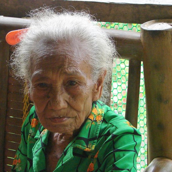 80 year old woman of the Ati people