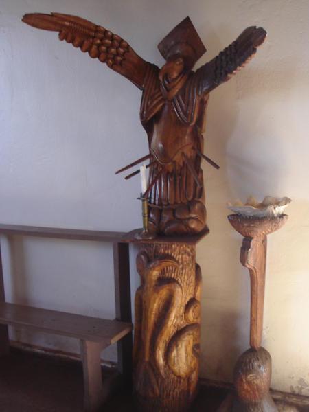 Statue of bird man angel in the church