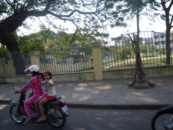 Smiley Young Girls On Moto