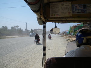 A Dusty Tuk Tuk Drive To Go Play With Guns