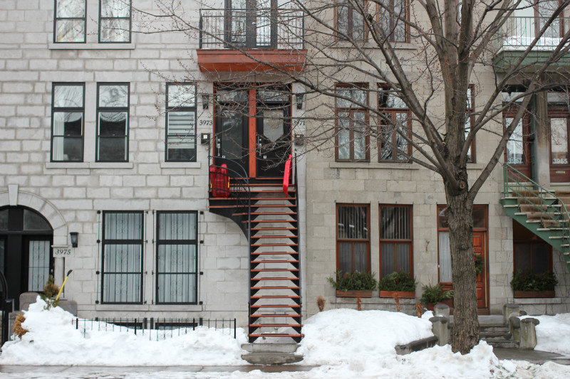 Long Stairs and Red Sleds By The Door