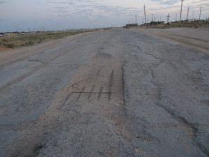 Rebar poking out of road, leaving Kazakhstan