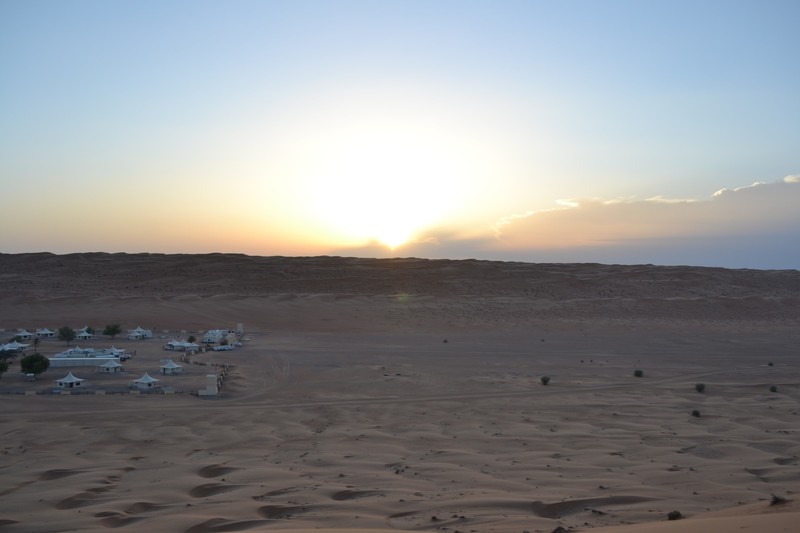 Sunset over the desert camp.