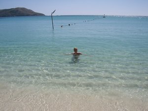 Dianna swimming in the crystal clear waters at Oarsmans Bay