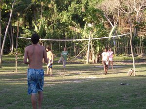 Partaking in a game of volleyball with some of the other guests and the staff at White Sandy Beach