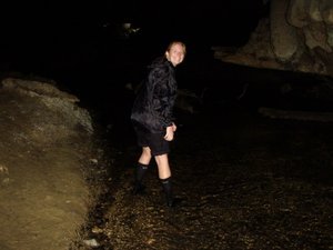 Dianna in the stream in Waipu Caves
