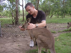 Matt feeding the kangaroos
