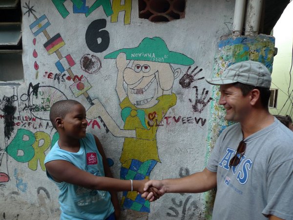 Dave being 'down with the kids' in the Rocinha favela, Rio