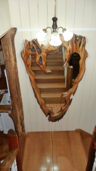 Timber Framed Mirror in Stairway
