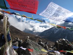 Buddist prayer flags with the Himalaya in the background