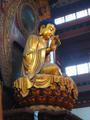De vergulde Boeddha van sandelhout uit de hoofdtempel.