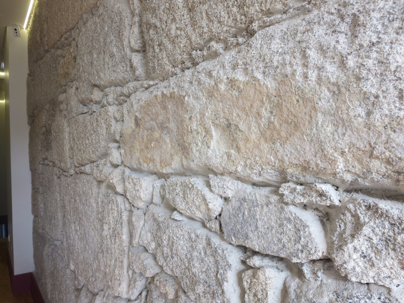 Old stone walls in the hallway