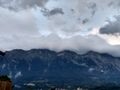 Clouds sitting on the Dolomites