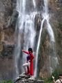 Chinese tourist posing at the big falls
