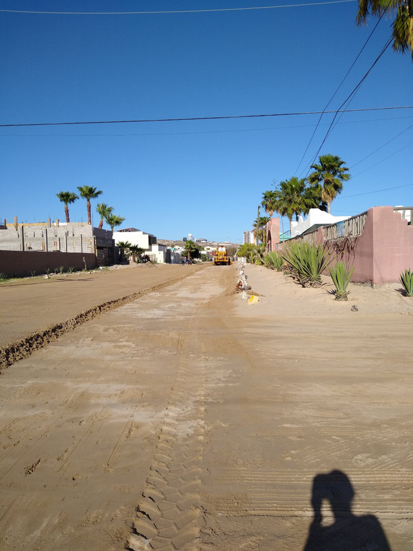 Grading the sand streets
