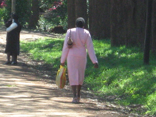 An example of how well people are dressed, as they walk along the roads