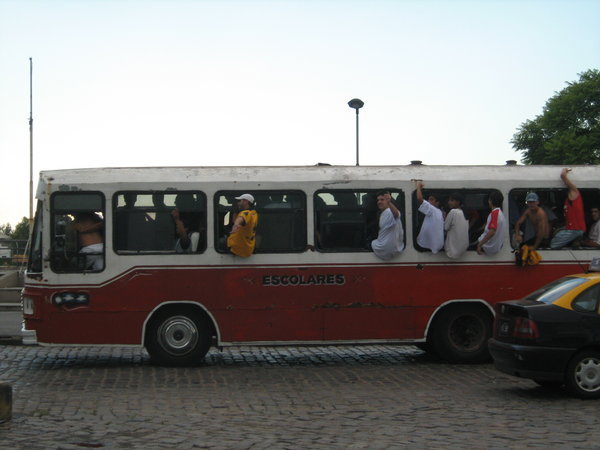 Opposing team fans arriving in three buses