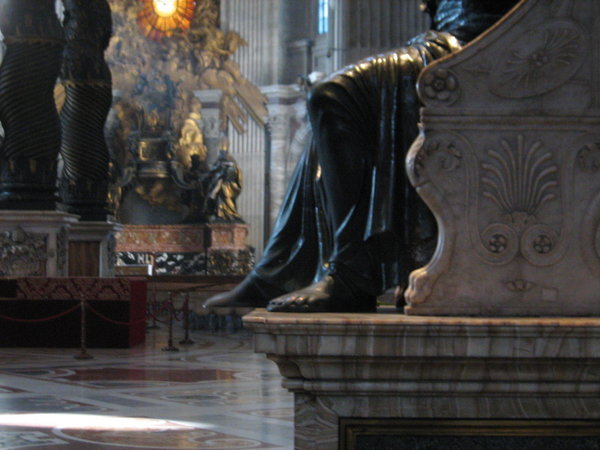 Feet of St Peter statue, worn from being kissed