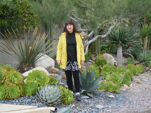 Posing in front of a beautiful succulent garden