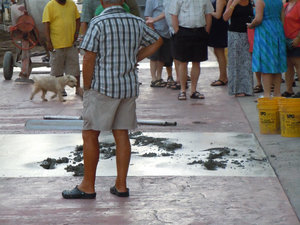 Drunk tourist ruins new cement sidewalk...