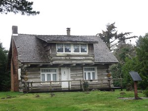 House built from wreckage of a log raft
