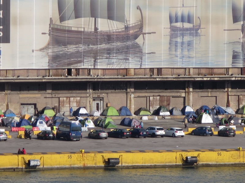 Refugees on the dock across from us in Athens