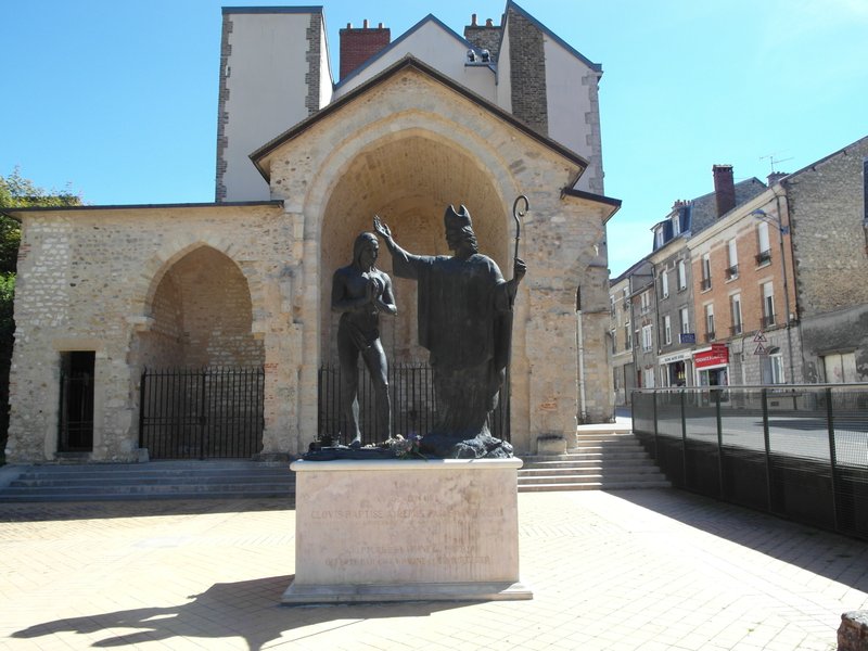 Statue of Saint Remi baptising Clovis in Reims