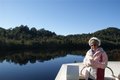 Sue(and hat)with Gordon River reflections