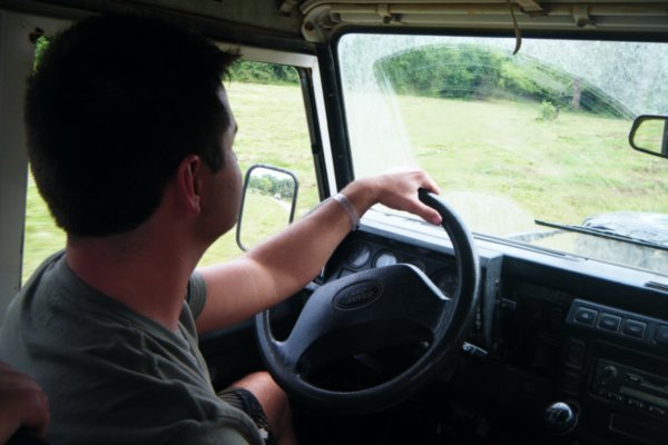 Jason behind the wheel, driving through Belize