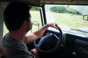 Jason behind the wheel, driving through Belize