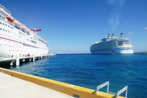 Carnival Elation with Royal Caribbean Oasis of the Seas in the back - Cozumel, Mexico