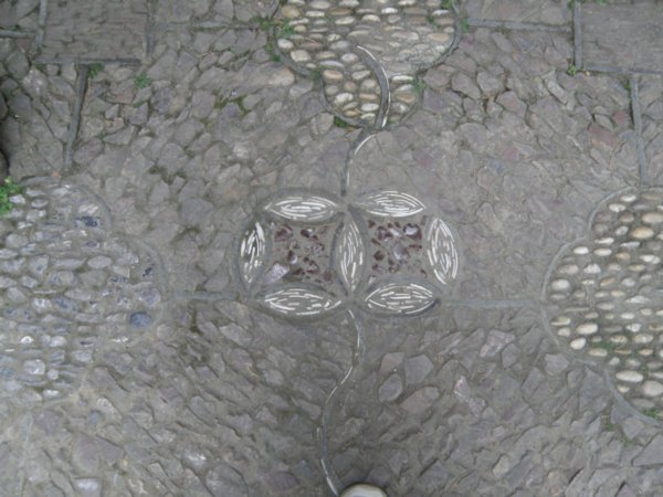 Two Coins design in walkway